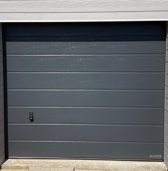 black PVC sectional garage door and black locking system